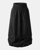 LEEZZA AMBER & MOON black long scuba skirt with a comfortable elastic waistband and modern flowy silhouette.